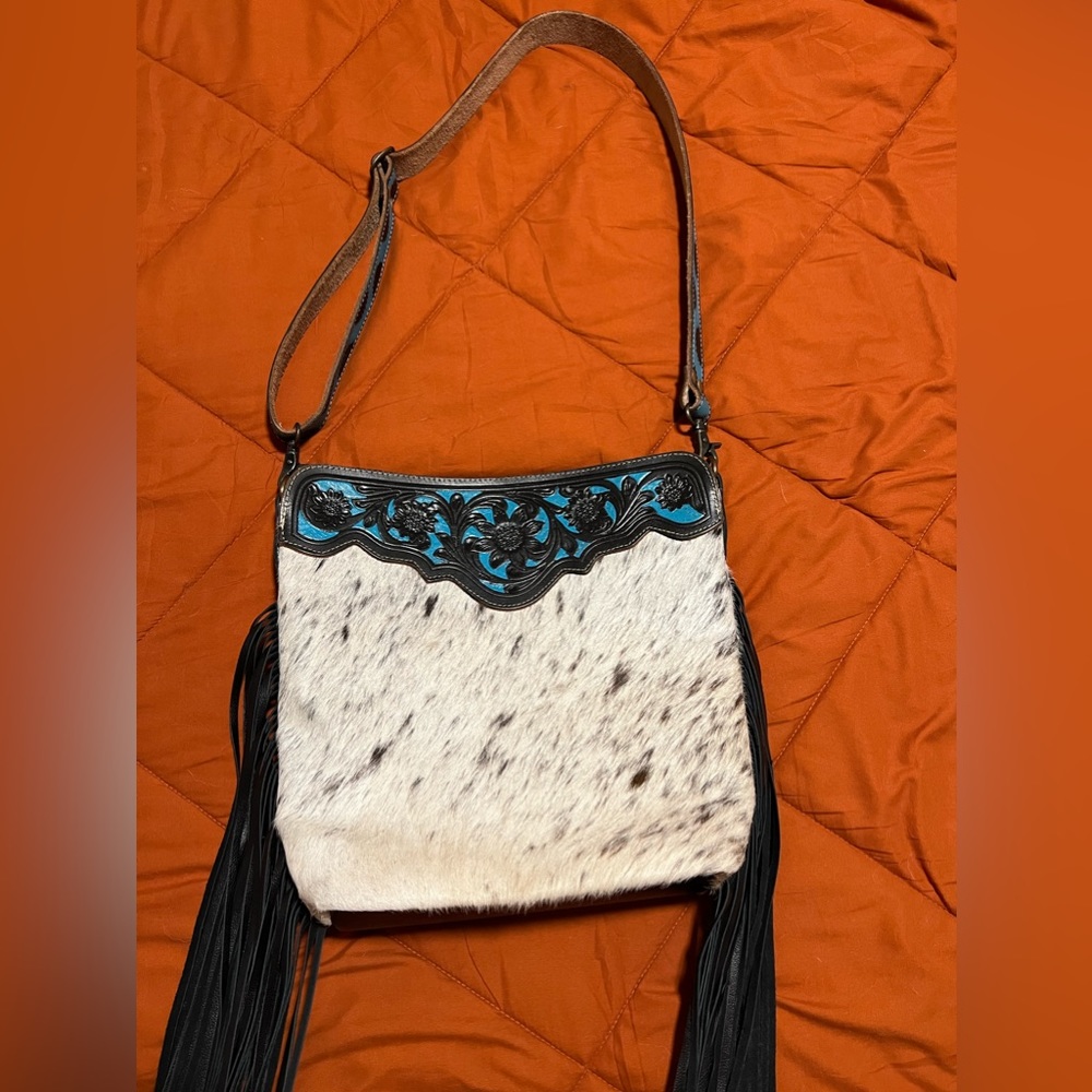 Hand tooled leather cow hide purse